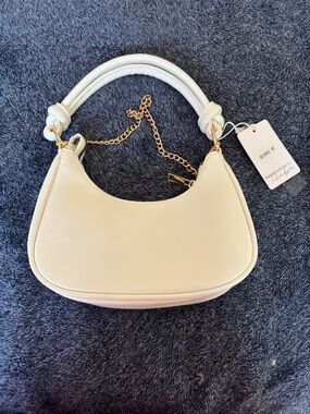 Cream Crescent Shoulder Bag with Gold Chain Accent